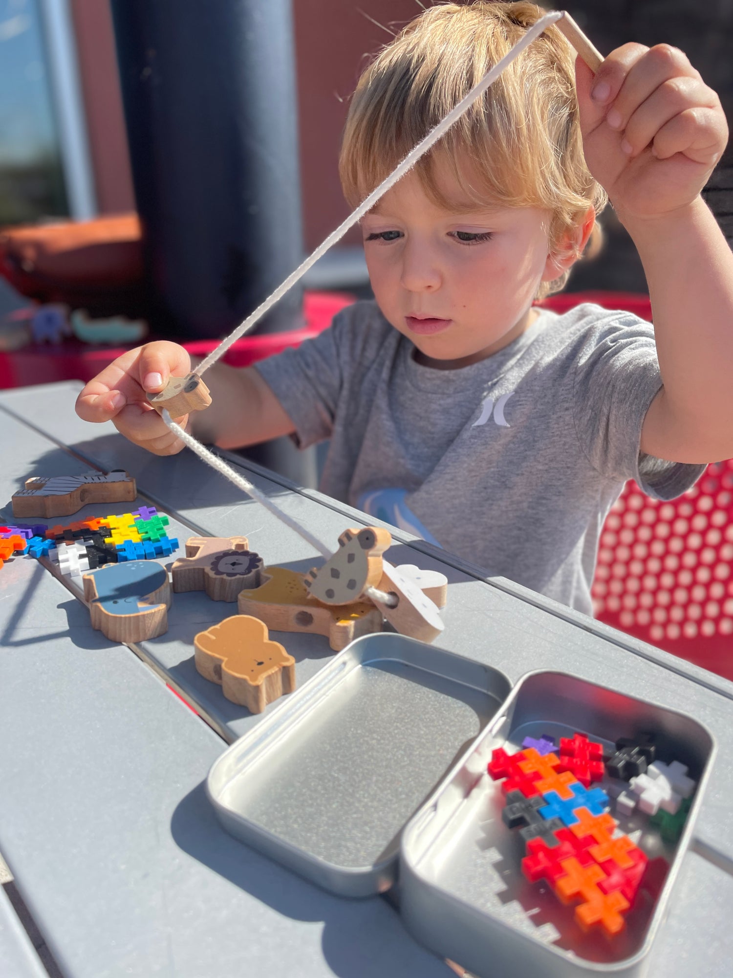 A kid playing with toys